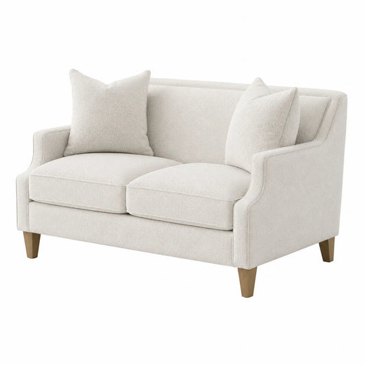 Sofa dwuosobowa z beżowej tkaniny z drewnianymi nogami
